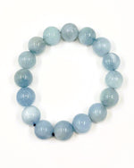 Load image into Gallery viewer, Light blue beaded bracelet on a white background