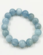 Load image into Gallery viewer, Light blue beaded bracelet on a white background