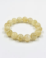 Load image into Gallery viewer, Yellow beaded bracelet on a white background
