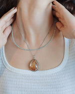 Load image into Gallery viewer, “rabbit hair” quartz pendant in silver setting