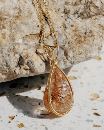 teardrop red rutilated quartz pendant