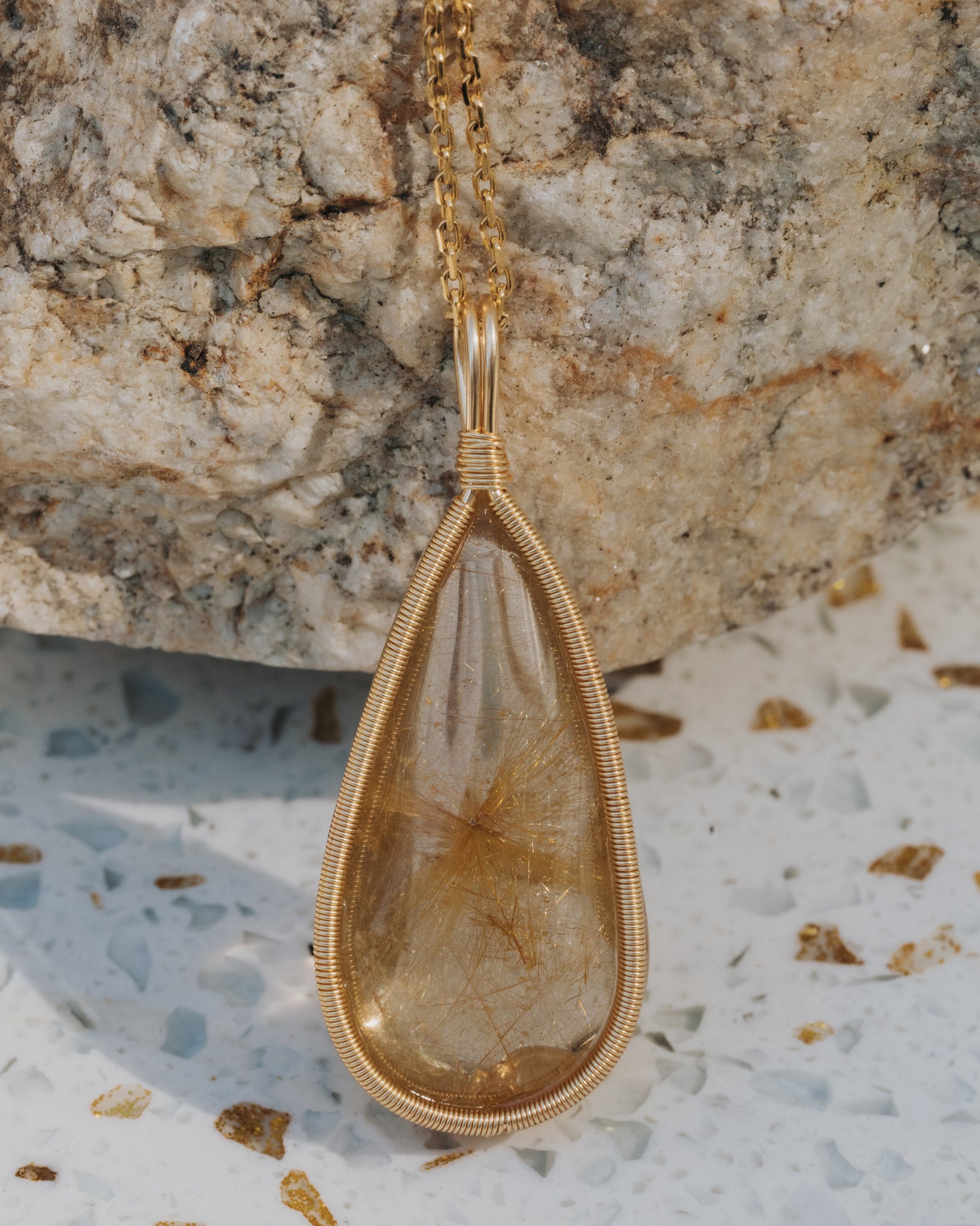 medium teardrop golden rutilated quartz pendant