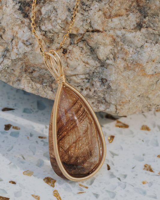 teardrop brown rutilated quartz pendant