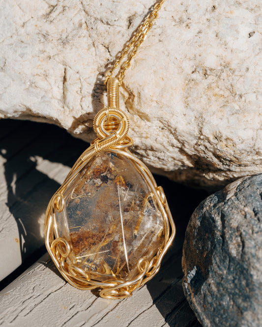 small sphere golden rutilated quartz pendant