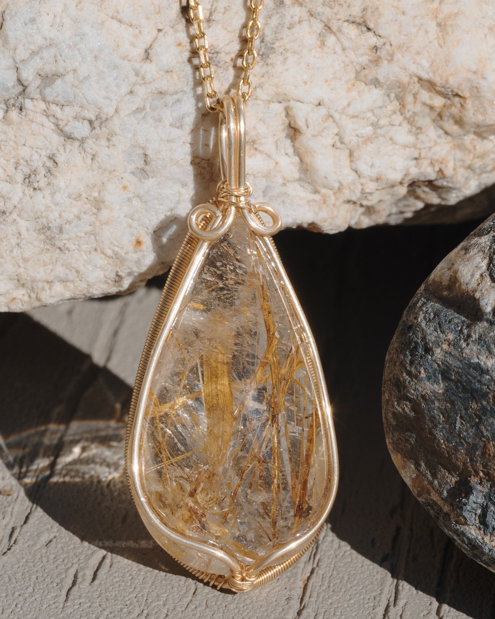 medium teardrop golden rutilated quartz pendant