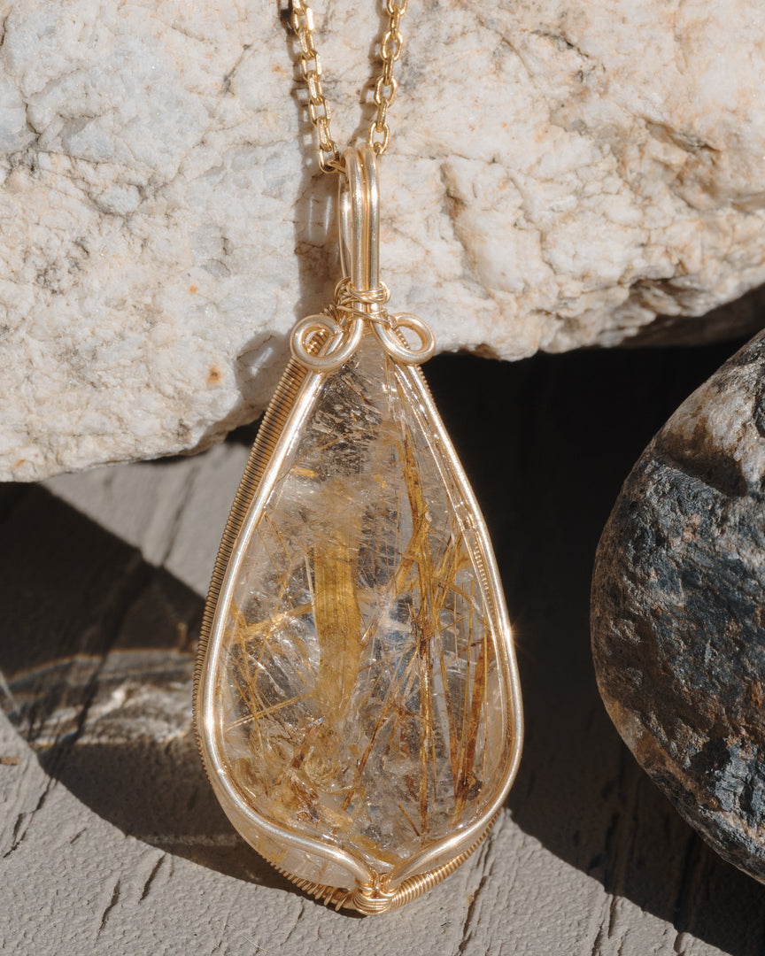 medium teardrop golden rutilated quartz pendant