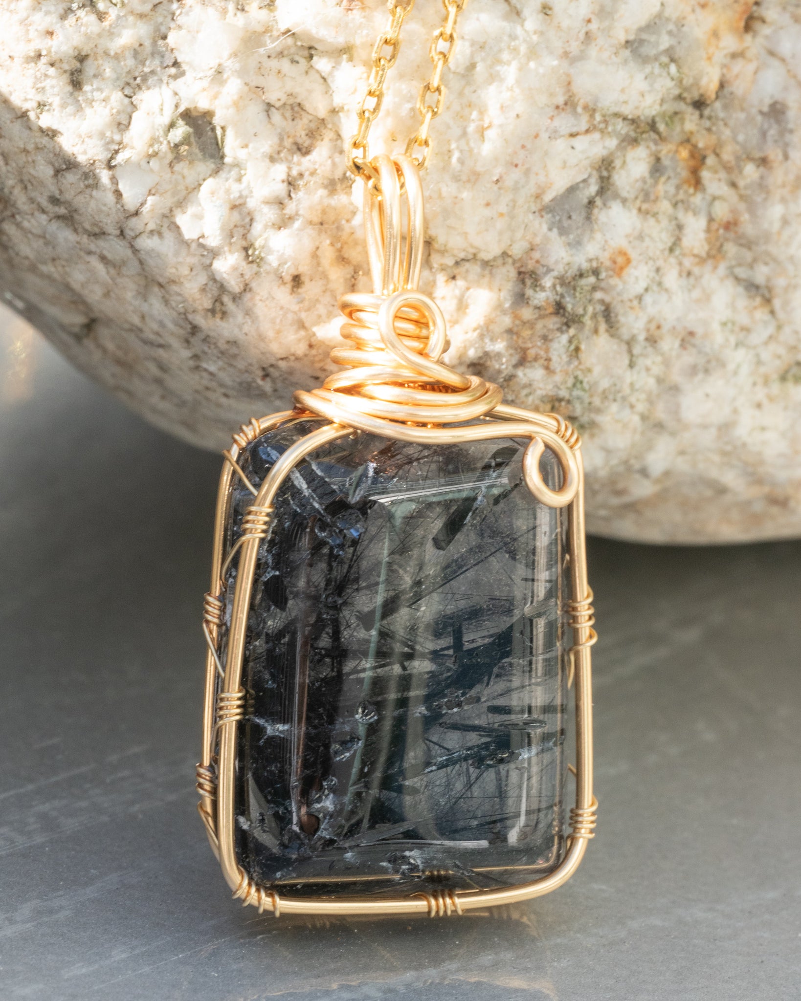 black rutilated quartz pendant