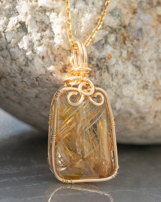 small trapezoid golden rutilated quartz pendant