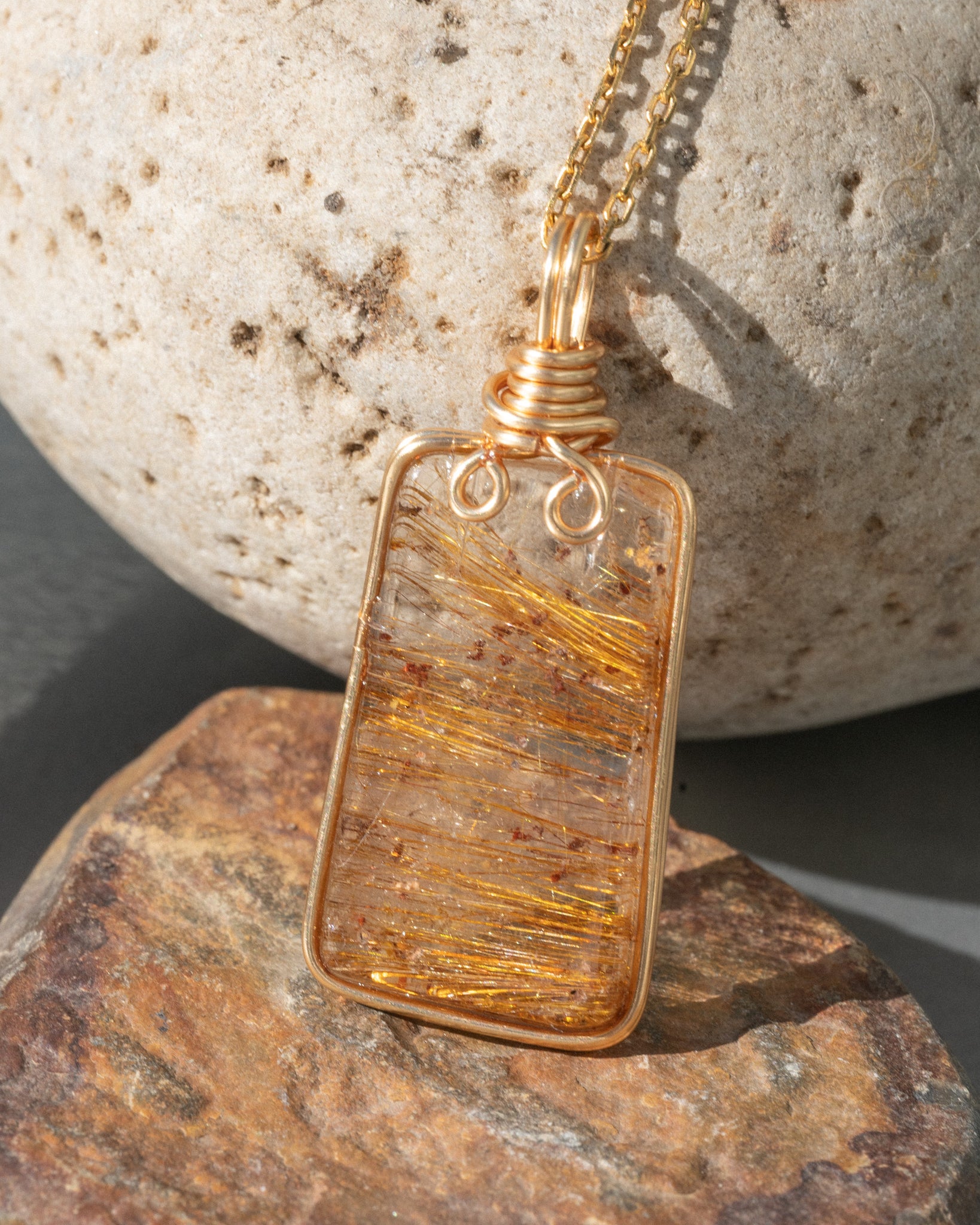 the starry night golden rutilated quartz pendant