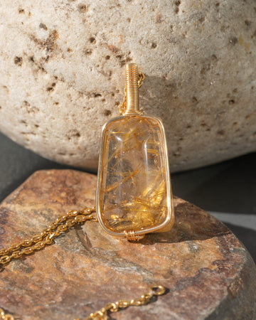 medium trapezoid golden rutilated quartz pendant