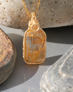 Load image into Gallery viewer, medium golden rutilated quartz amulet pendant
