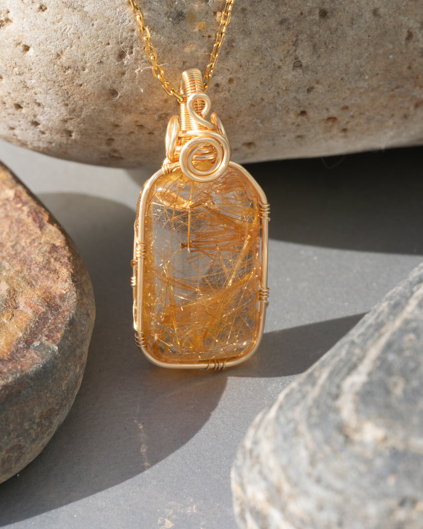 medium golden rutilated quartz amulet pendant