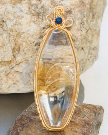 oval hematoid quartz pendant