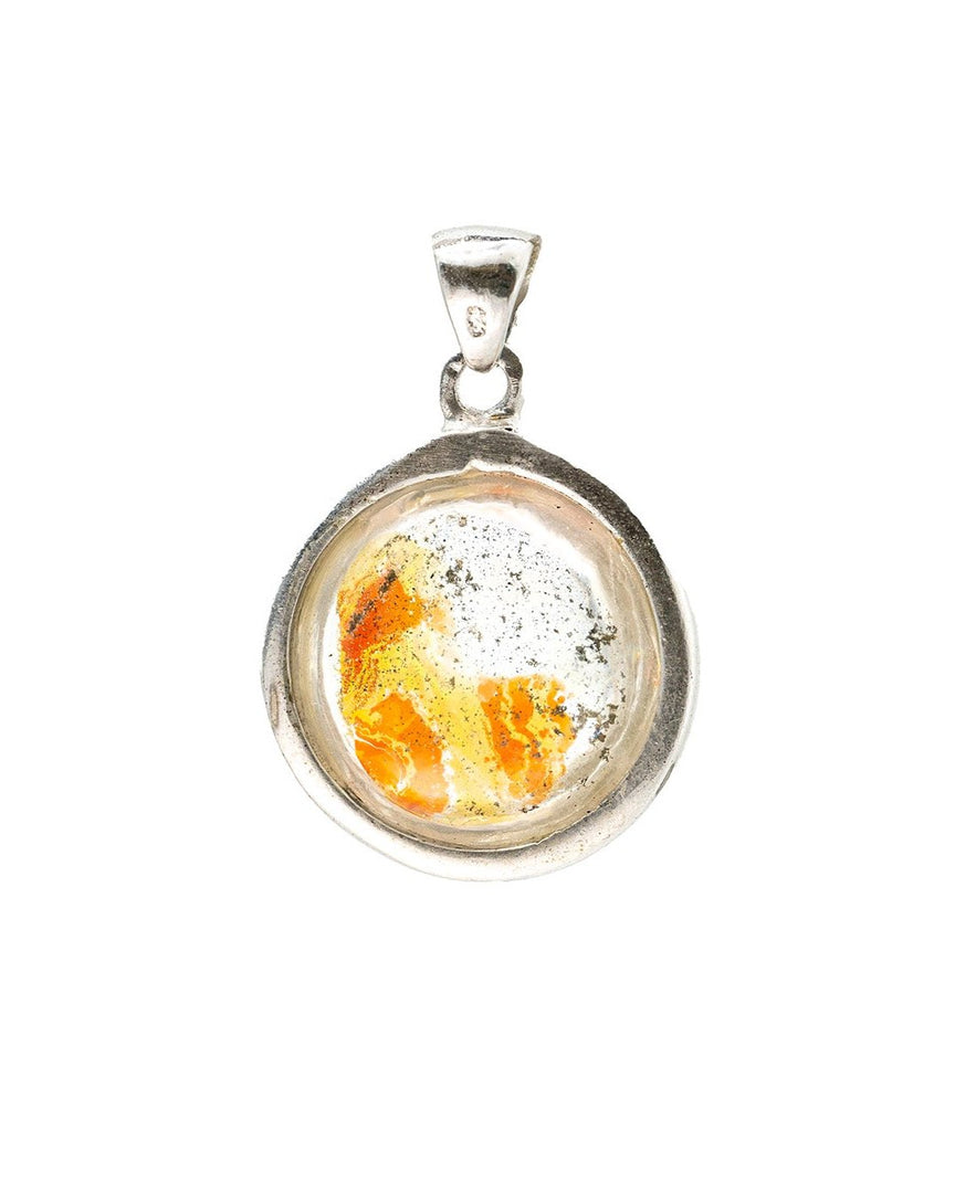 round hematoid quartz pendant in silver setting