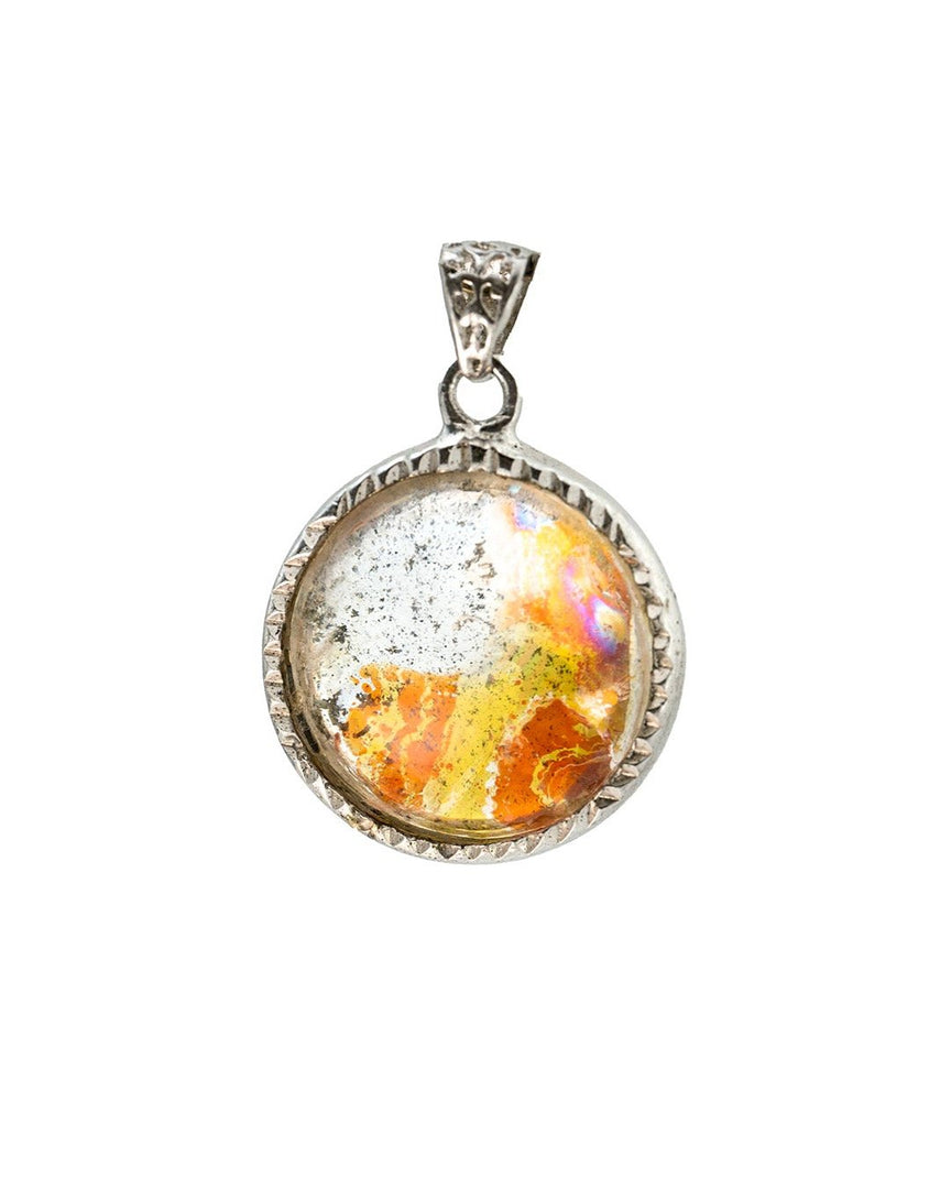 round hematoid quartz pendant in silver setting