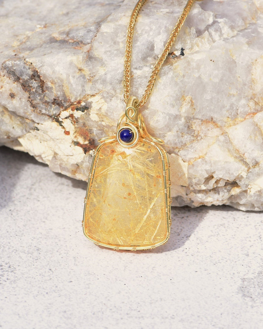 small golden rutilated quartz tower pendant