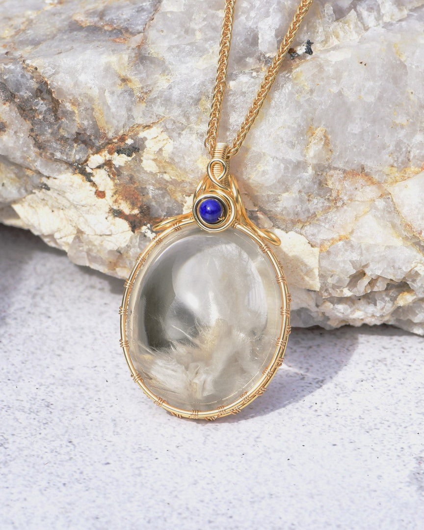 white “rabbit hair” quartz pendant