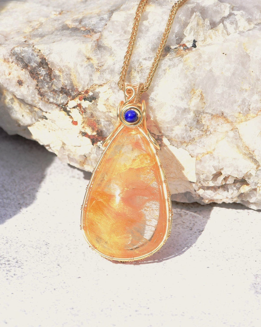 medium teardrop gold rutilated quartz pendant