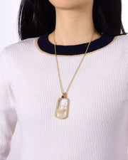 large clear rutilated quartz pendant