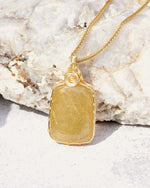 Load image into Gallery viewer, golden rutilated quartz amulet pendant
