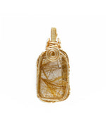 Load image into Gallery viewer, medium golden rutilated quartz amulet pendant
