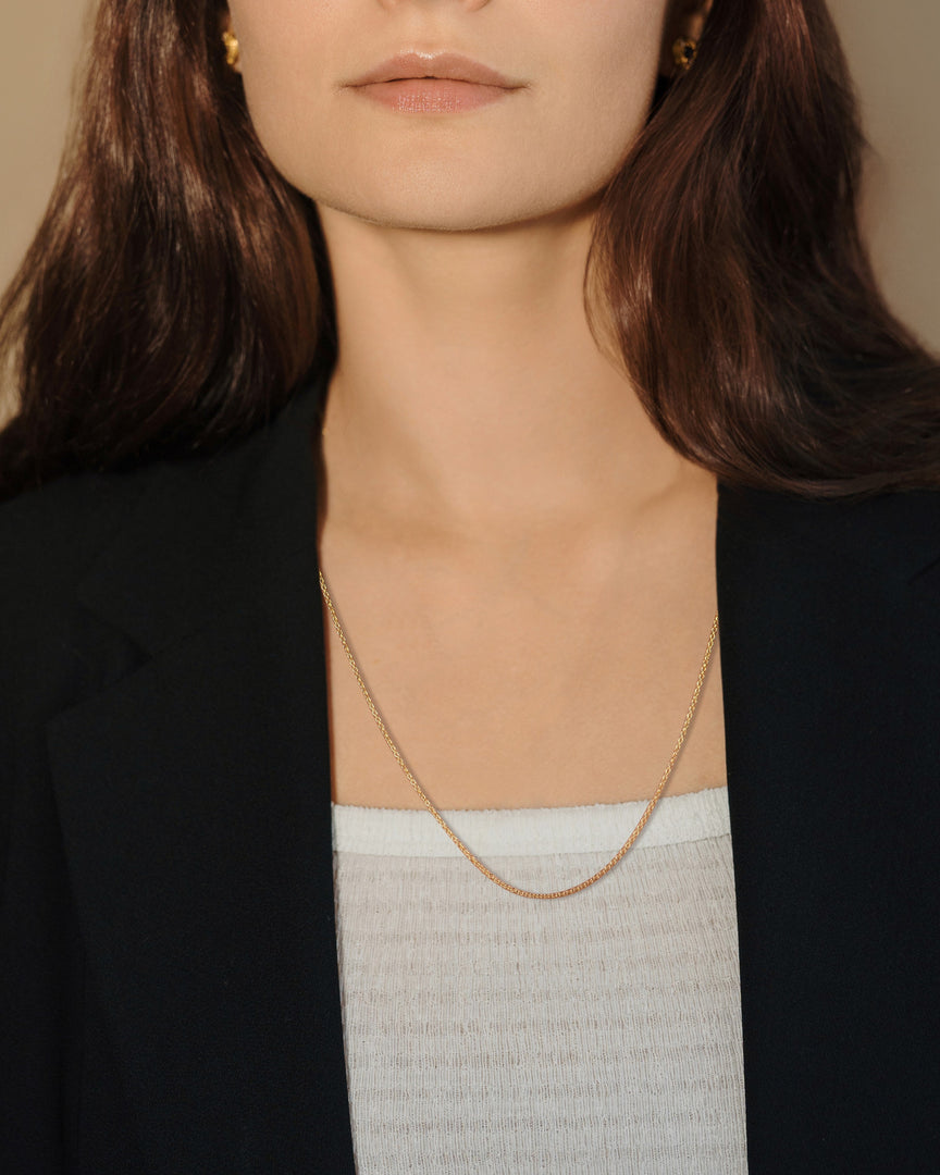 oval link golden chain necklace