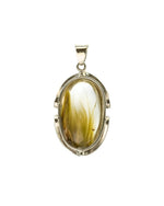 Load image into Gallery viewer, “rabbit hair” quartz pendant in silver setting
