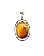 Load image into Gallery viewer, oval “rabbit hair” quartz pendant in silver setting
