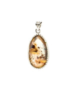 Load image into Gallery viewer, oval golden rutilated quartz pendant in silver setting
