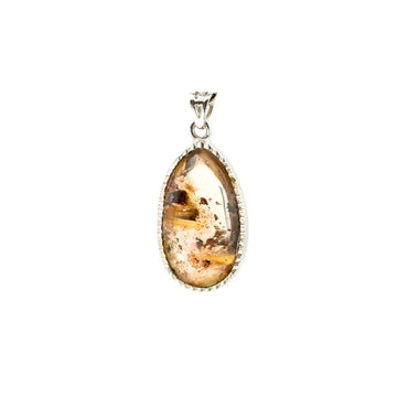 oval golden rutilated quartz pendant in silver setting