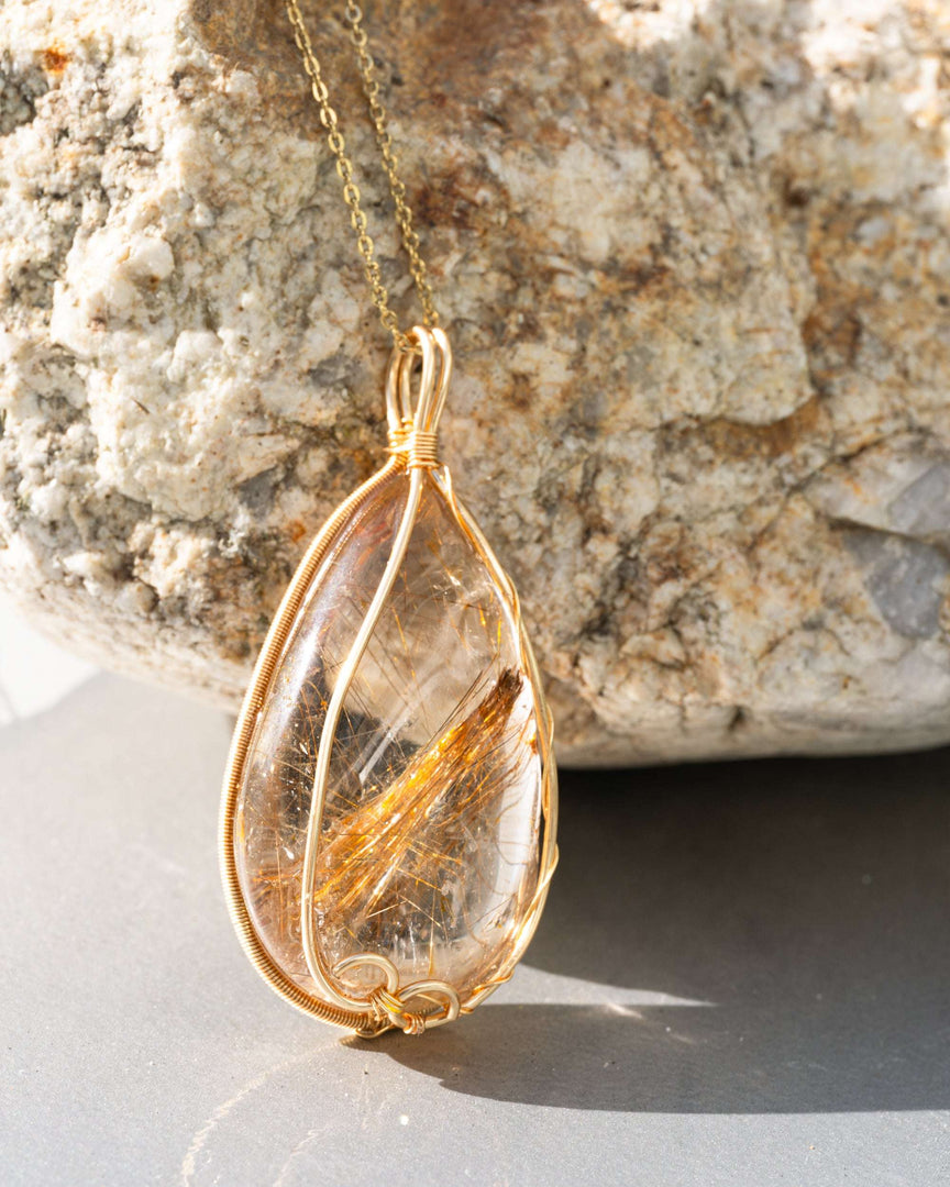 large teardrop golden rutilated quartz pendant