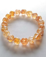 Load image into Gallery viewer, Hematoid Quartz Bracelet (Yellow) on a white background