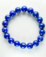 Load image into Gallery viewer, Blue beaded bracelet on a white background