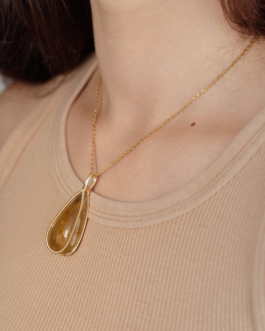 medium teardrop golden rutilated quartz pendant