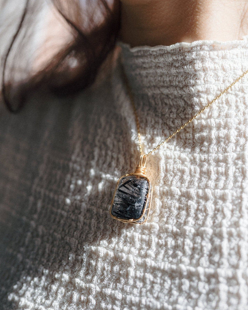 black rutilated quartz pendant