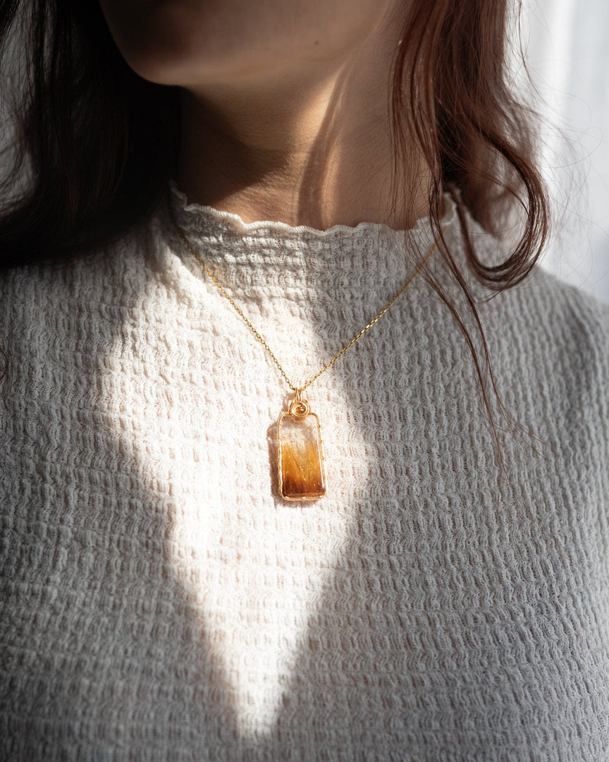 straw golden rutilated quartz pendant