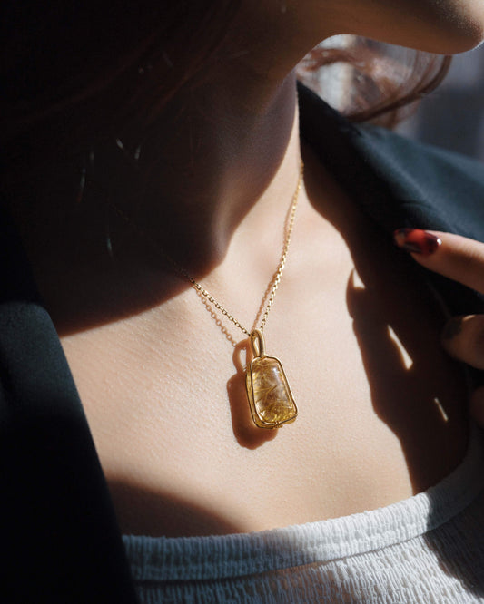 medium trapezoid golden rutilated quartz pendant