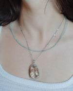 Load image into Gallery viewer, seabed world phantom quartz pendant in silver setting
