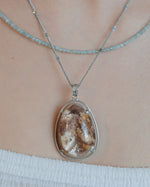 Load image into Gallery viewer, seabed world phantom quartz pendant in silver setting
