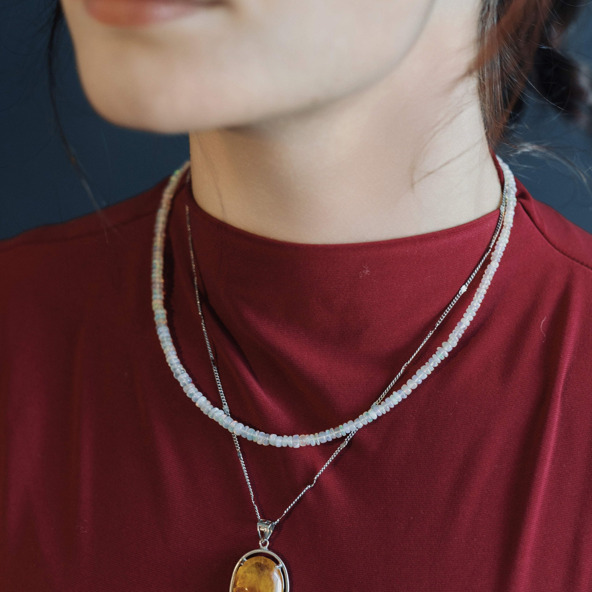 oval “rabbit hair” quartz pendant in silver setting