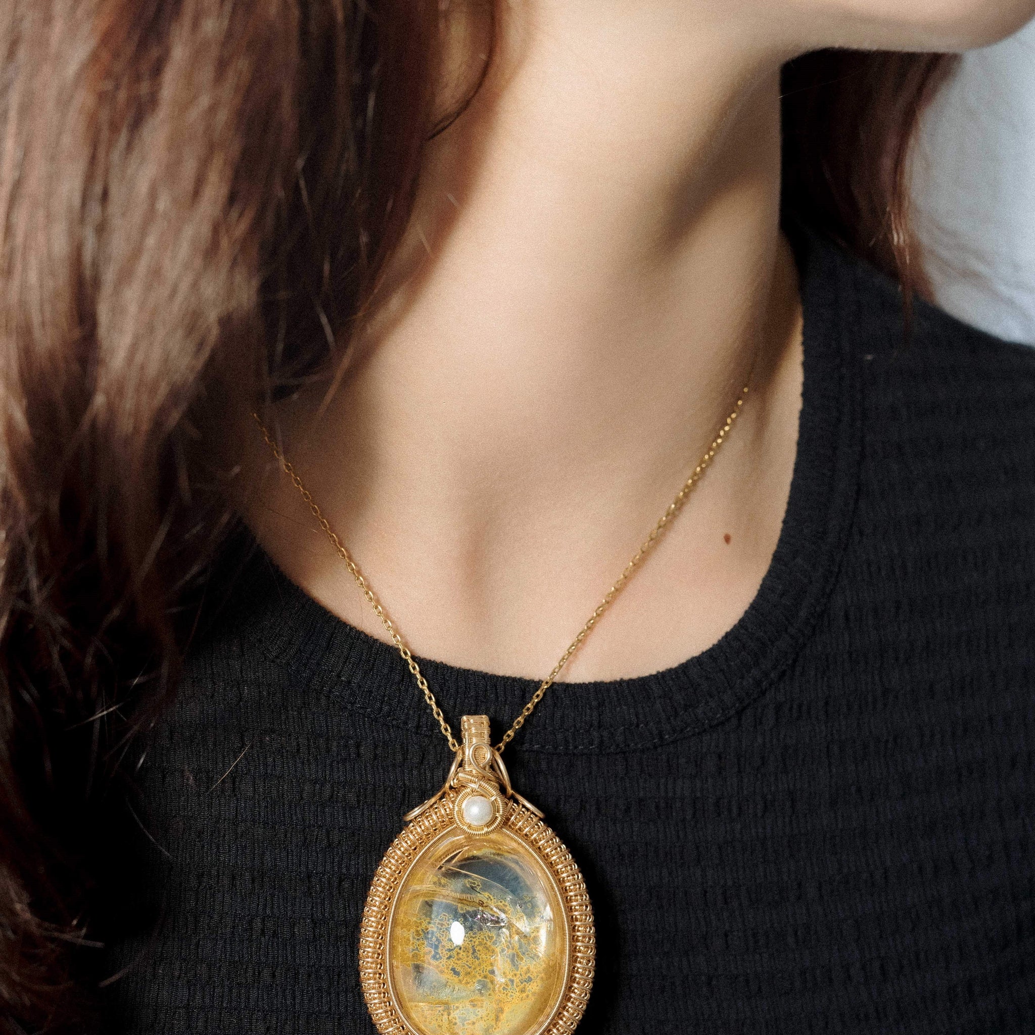 elegant oval hematoid quartz pendant