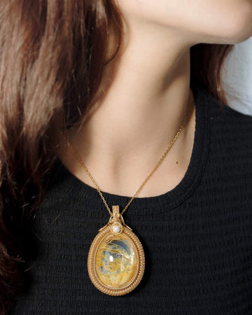 elegant oval hematoid quartz pendant