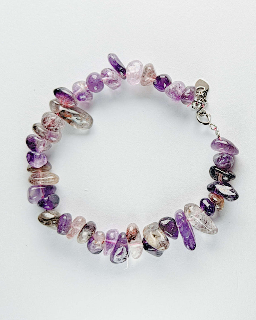Multicolored beaded bracelet on a white background