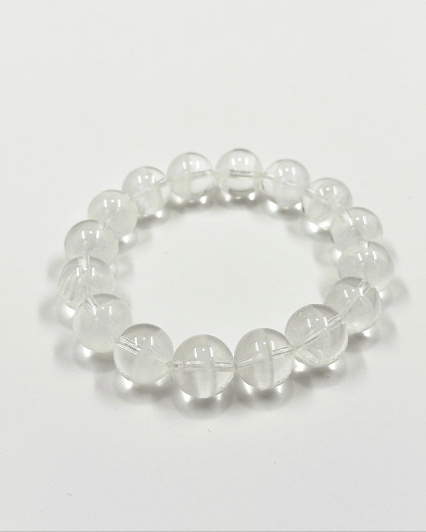Clear beaded bracelet on a white background