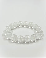 Load image into Gallery viewer, Clear beaded bracelet on a white background