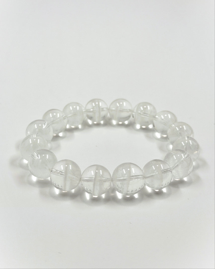 Clear beaded bracelet on a white background