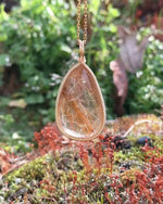 Load and play video in Gallery viewer, large teardrop golden rutilated quartz pendant
