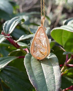 Load and play video in Gallery viewer, medium teardrop golden rutilated quartz pendant
