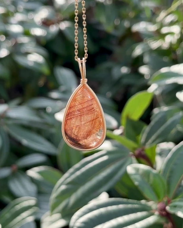 teardrop brown rutilated quartz pendant